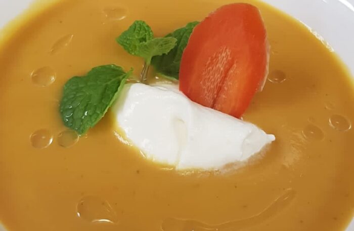 Creamy Pumpkin Velouté with Candied Ginger and a Dollop of Cream